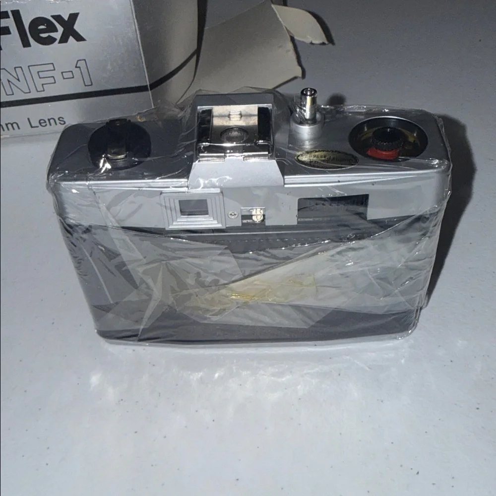 OptiFlex NF-1 35mm Film Camera with 50mm Lens Silver Black and Case